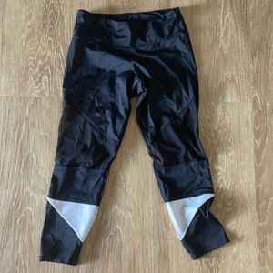 Black leggings with mesh and white detailing